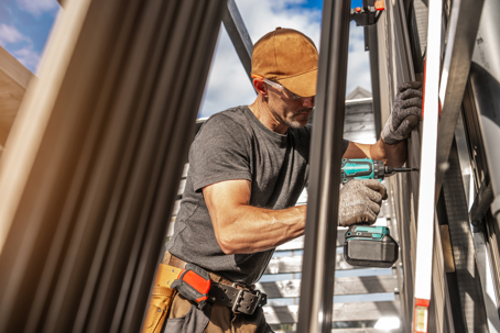 construction worker using power tool
