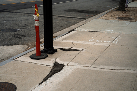 damaged urban sidewalk