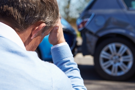 Stressed Driver Sitting At Roadside